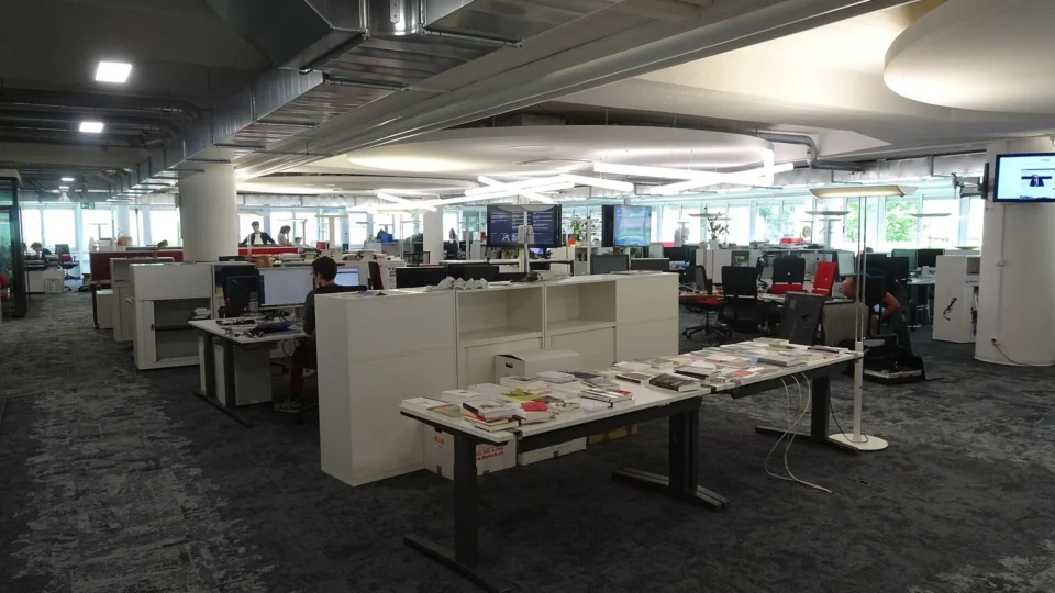 Open-plan newsroom of Le Temps newspaper in Lausanne