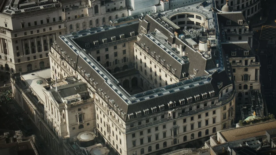 A detailed aerial shot of the historical Bank of England in London, showcasing its grand architecture.