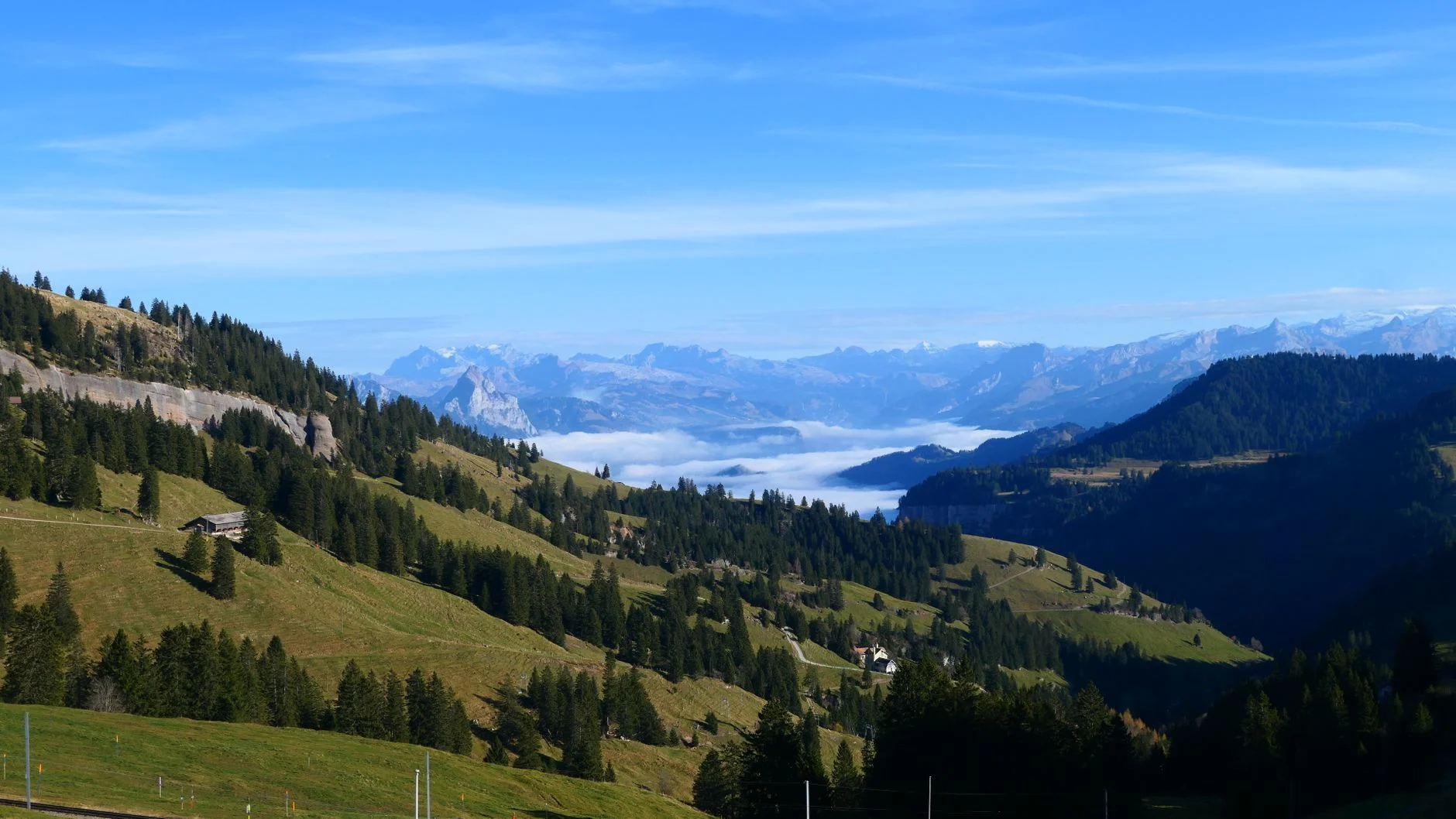 Breathtaking landscape of the Swiss Alps with a sea of fog from a high vantage point in Arth, Schwyz.