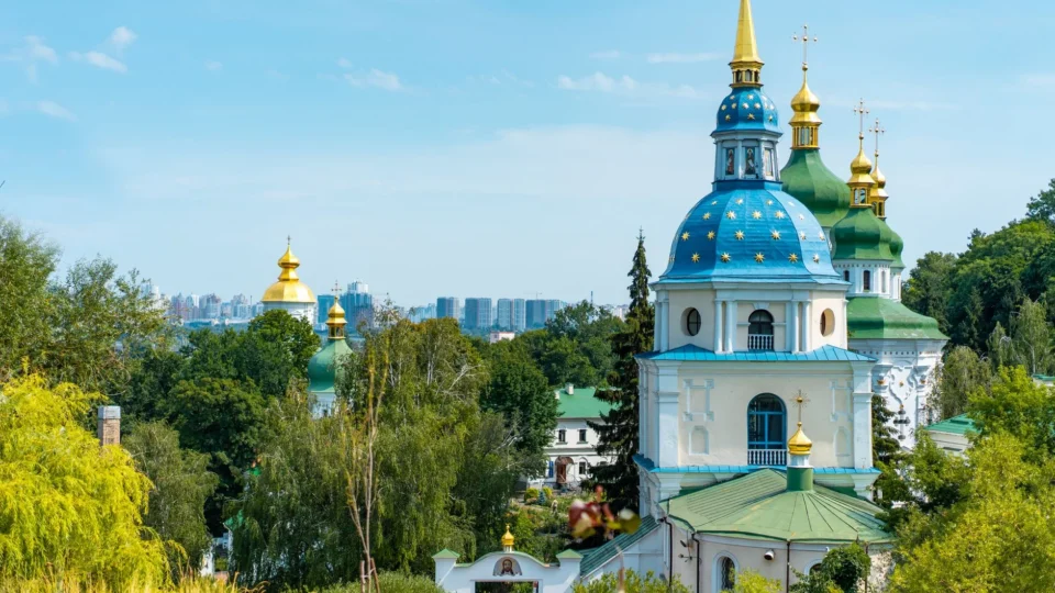 Scenic view of St. Michael's Golden-Domed Monastery in Kyiv, Ukraine with clear blue sky.